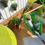 Závěsné houpací křeslo La Siesta Domingo Comfort - lime na terase